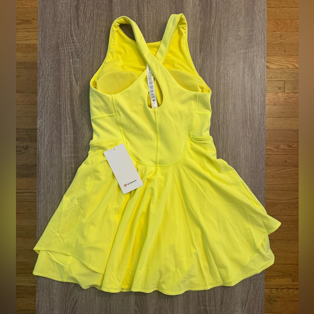 New with tags Lululemon Court crush dress, yellow, size 8.Electric lemon.Tennis